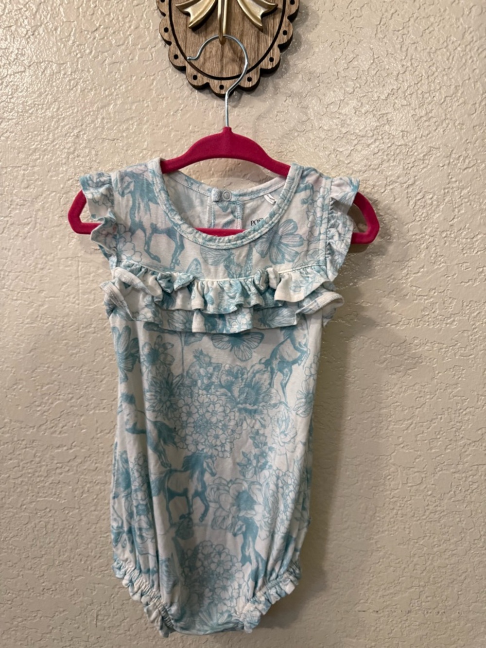 Posh Peanut Blue Floral Ruffle Infant Onesie